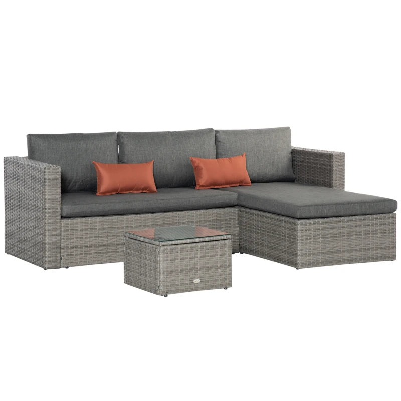 Grey PE rattan outdoor sofa set with chaise, padded cushions, and tempered glass table