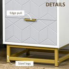 Embossed drawer front with gold edge pull on a white and grey bedside cabinet