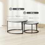 Two round marble-effect stacking tables with white tops and black frames