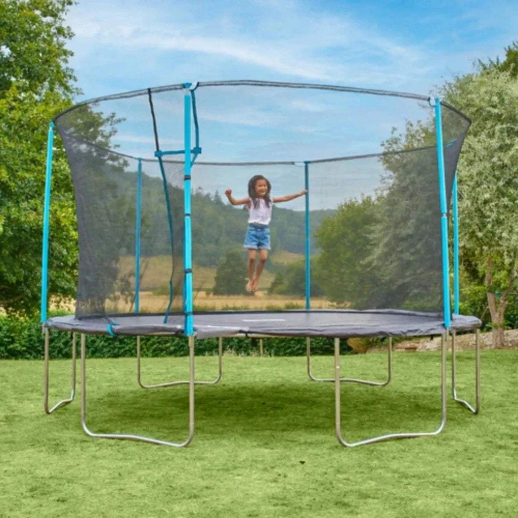 Outdoor trampoline with gray jumping mat, blue frame, and mesh safety net