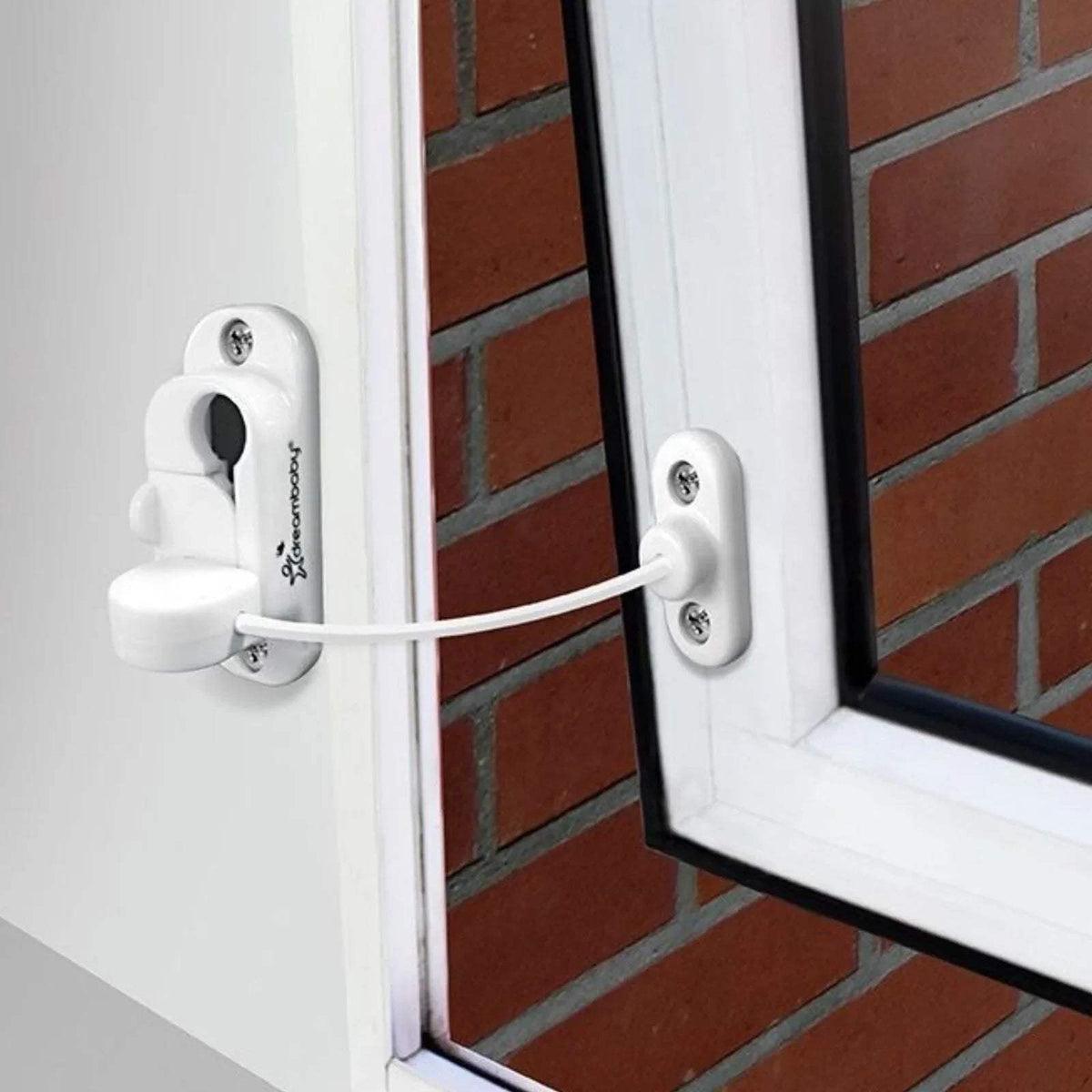 White keyless window restrictor with two plates and cable, mounted on window