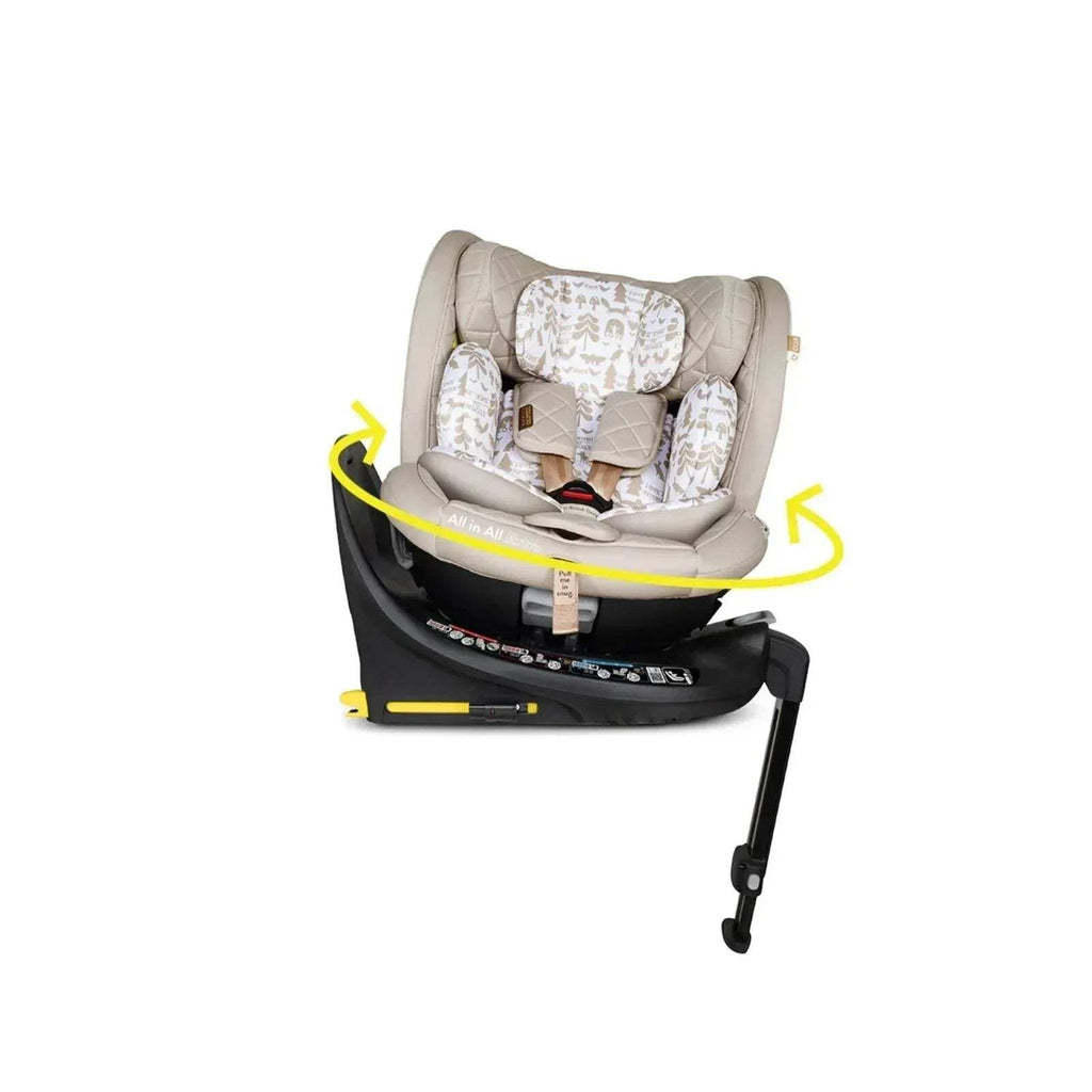 Beige baby car seat with animal-print cushion and padded harness on black base, side view