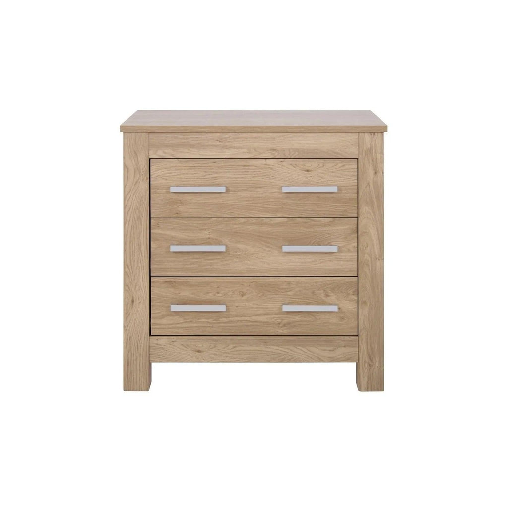 Oak baby dresser with changing top, four drawers and silver bar handles