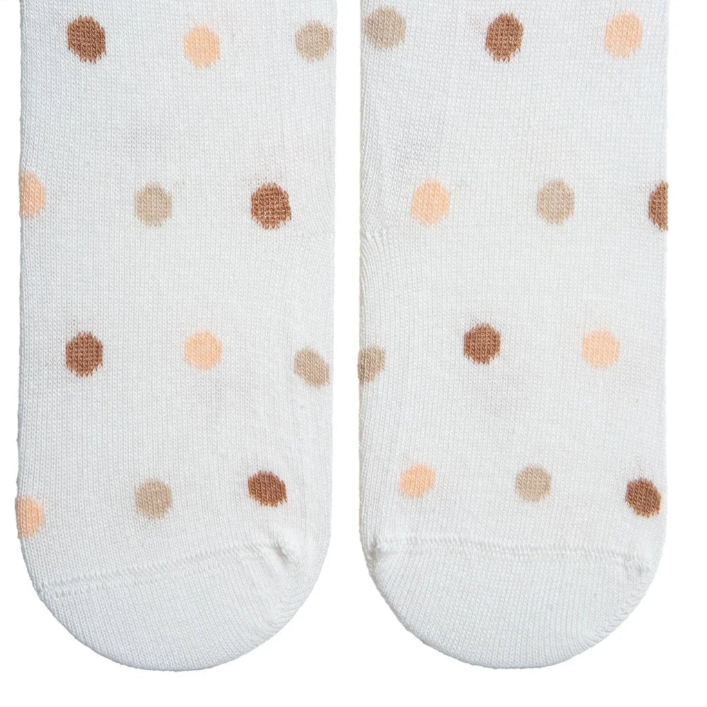 Girls polka dot tights showing reinforced toe area with small dot pattern