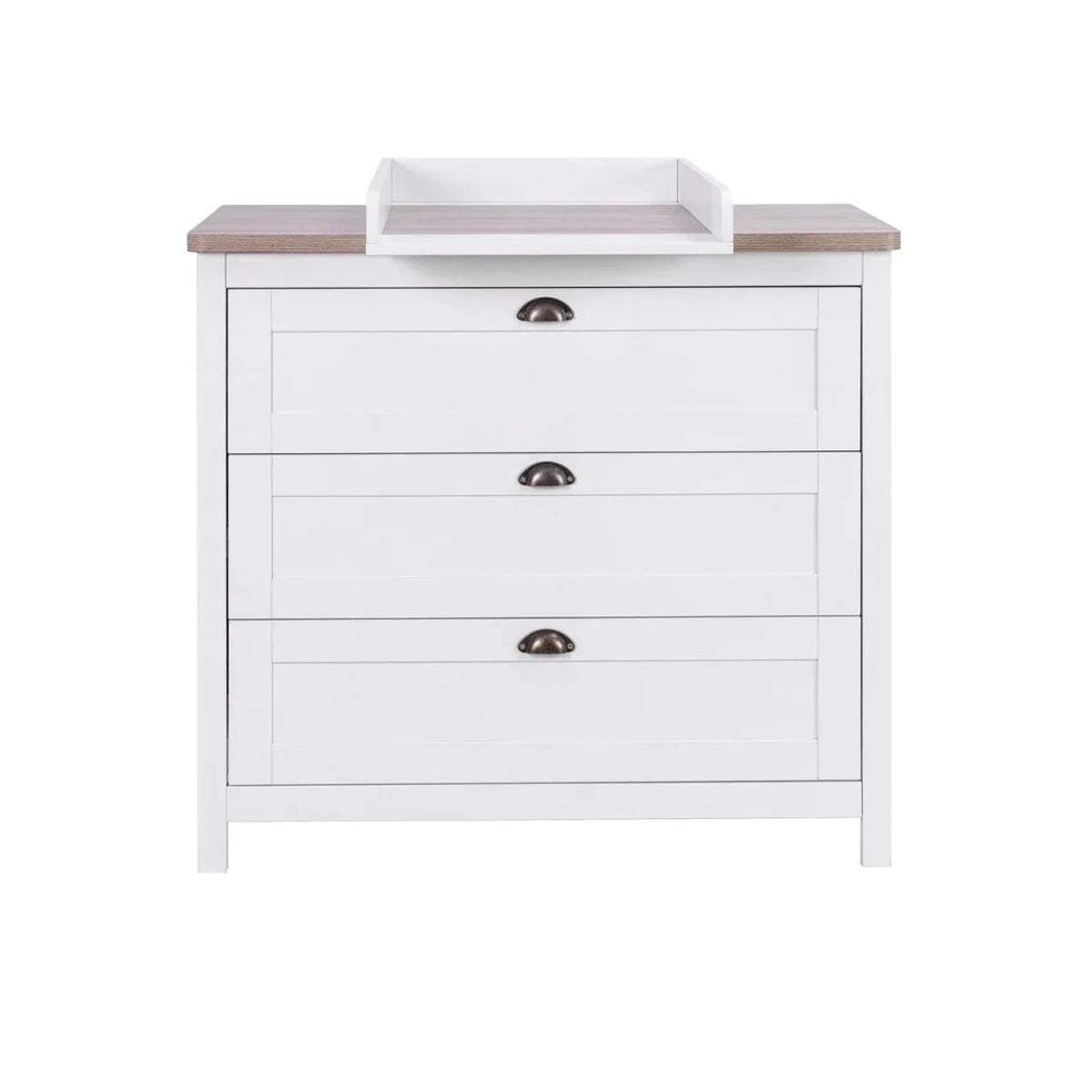 White changing dresser with light wood top, three drawers, and dark metal cup pulls