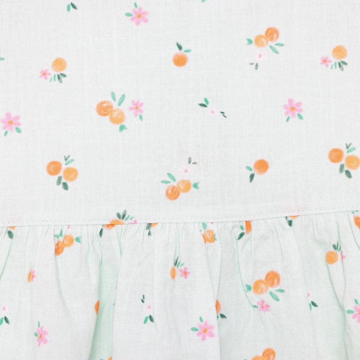 Light blue floral-print newborn dress with gathered waist and soft pleated skirt