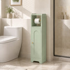 Light green slim bathroom storage cabinet with toilet roll holder beside a toilet
