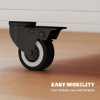 Black caster wheel on the base of a white folding dining table