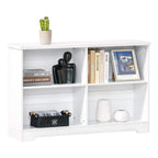 White wooden bookcase with open cube compartments for books, decor, and small storage.