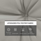 Light grey tufted polyester cushion fabric close-up with stitched button tufting