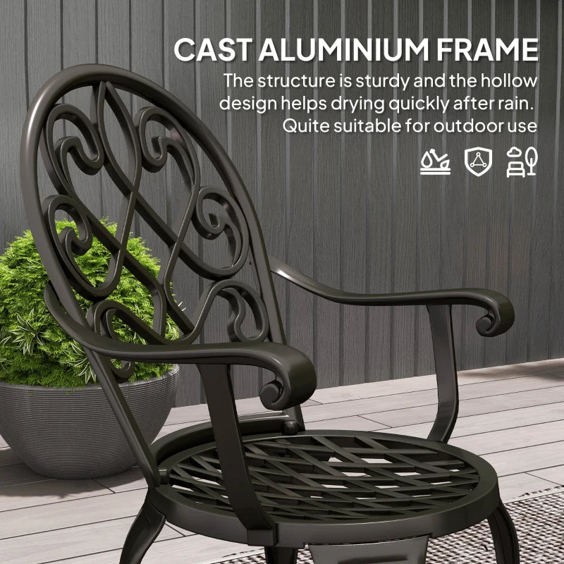 Black cast aluminum garden chair with ornate scroll back and slatted seat, set part