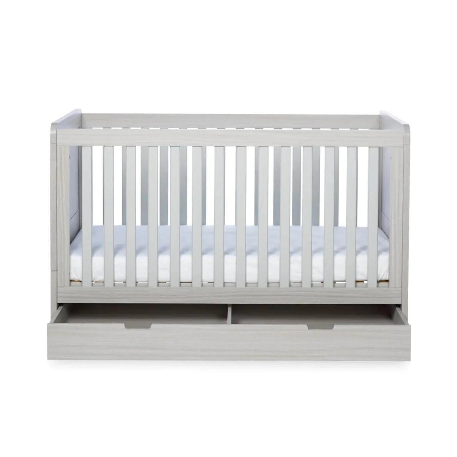 Ash grey cot bed with drawer section visible under the white mattress