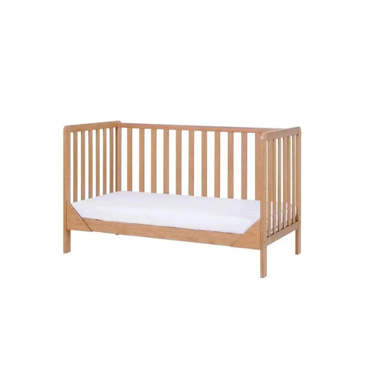 Honey oak cot bed with tall end rails and white mattress