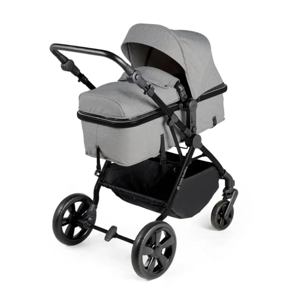 Space grey bassinet-style stroller seat with canopy; padded top and black wheel frame