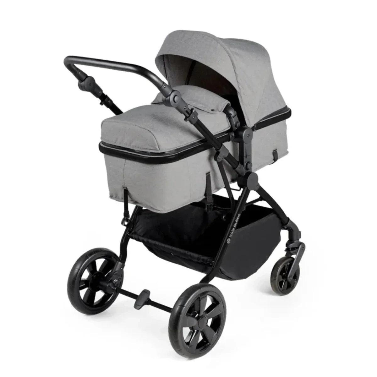 Space grey bassinet-style stroller seat with canopy; padded top and black wheel frame