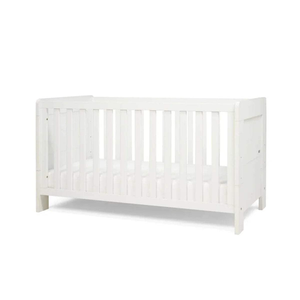 White cot bed end panel with vertical safety rails