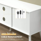 White TV cabinet base showing cable access area beneath the top panel