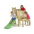 Wooden kids climbing frame with green slide, viewed with children playing