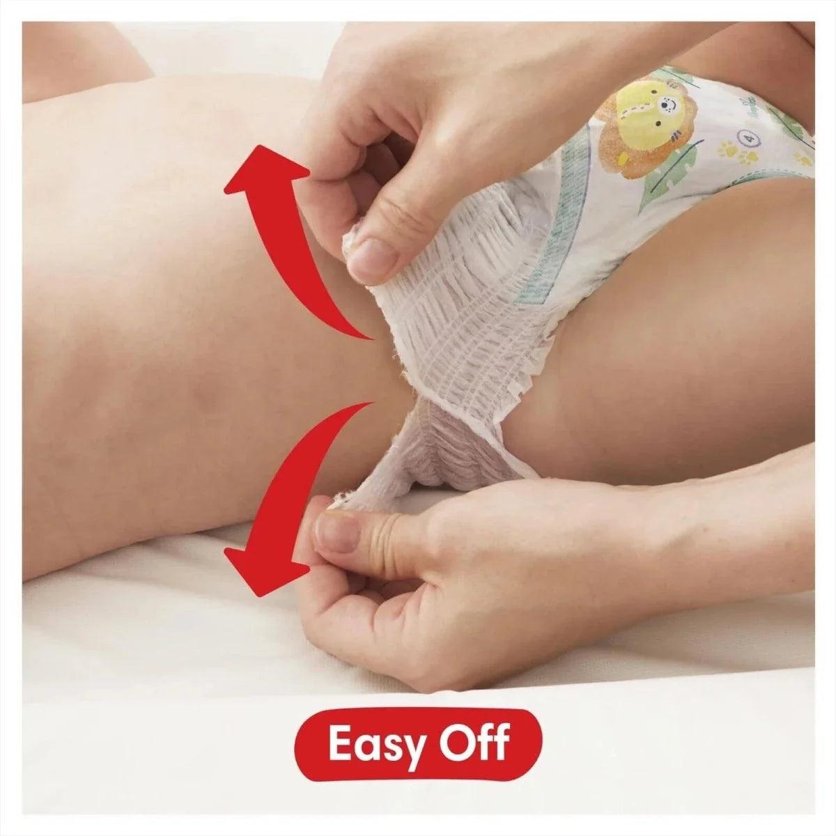 Baby-Dry pants diaper with easy-off removal, hands pulling tabs