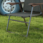 Folding garden chair with dark brown frame, dark mesh seat, and padded armrests