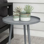 Grey round outdoor side table with circular top and tapered steel legs