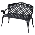 Black cast aluminum garden bench with arched back and slatted seat