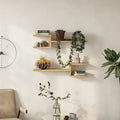 Floating modern shelf set with light wood boards and cube brackets, short wall display