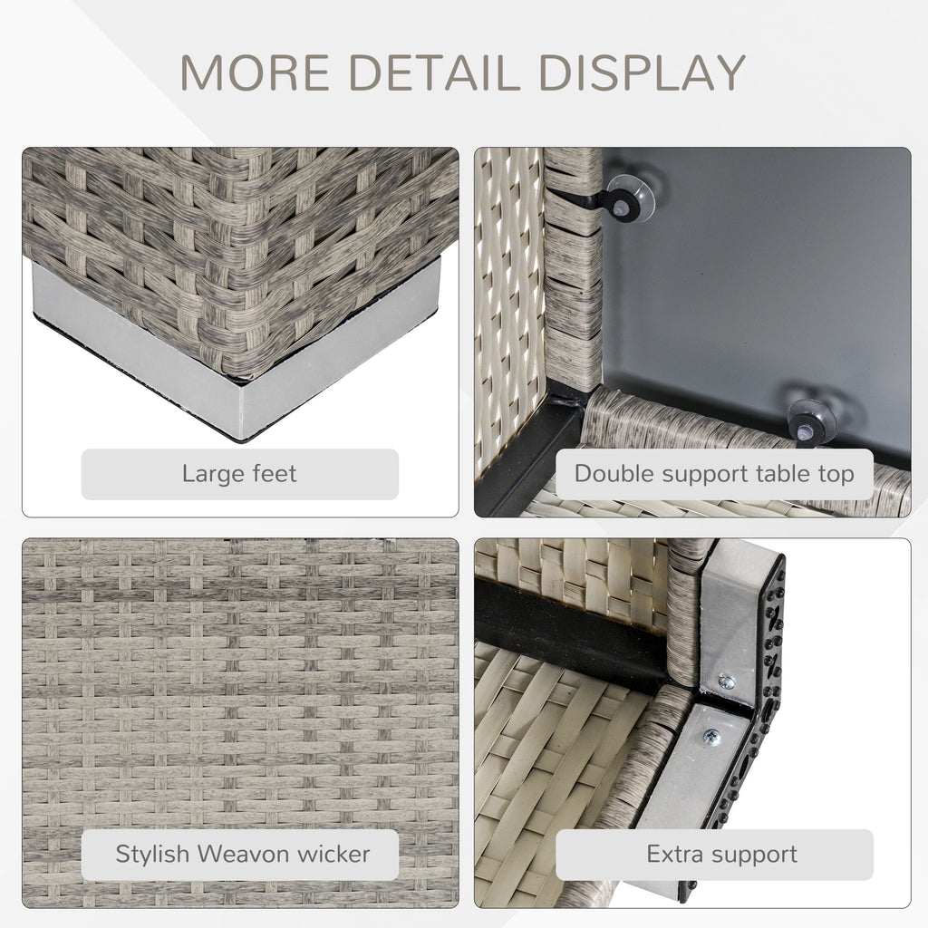 Wicker table details showing woven finish, reinforced glass top, and large metal feet