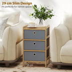 Light grey fabric drawer dresser with bamboo frame, three drawers and round pull handles
