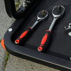 Black tool tray with molded slots and chrome spanner wrenches on rolling stool