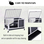 Grey and white lift-top hutch with open roof and wire mesh top, sliding tray access
