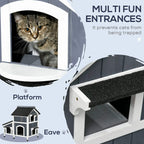 Grey wooden cat house close-up of multi entrance openings and front platform