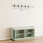 Light green entryway shoe cabinet with open shelves and wall hook rail