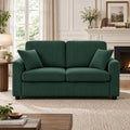Dark green corduroy 2-seat sofa with three cushions and two matching throw pillows