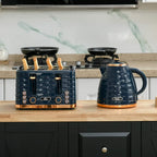 Blue toaster and electric kettle on a wooden counter in front of cabinets