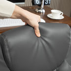 Charcoal grey padded backrest and armrest cushion on a faux leather office chair