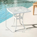 White cast aluminium patio end table with lattice tabletop, center umbrella hole, curved legs
