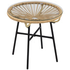 Beige round rattan side table with clear tempered glass top and black metal legs