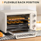 Cream mini countertop oven with open door showing multi-level rack positions