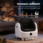 White automatic cat litter tray on feet with dark interior and quiet design indicators.