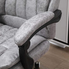 Grey padded armrest on an office massage chair with side control panel