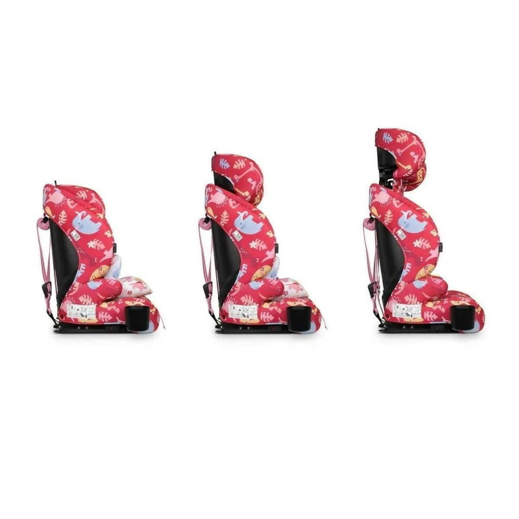 Red dinosaur-print car seat, rear-side view with reclined backrest and harness straps