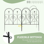 Black decorative metal fence panels with heart-shaped arches, scrollwork, and pointed finials
