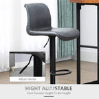 Dark grey bar stool with backrest, footrest ring, and height-adjustable column