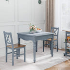 Grey dining chair with X cross-back, warm wood seat, and straight legs