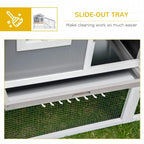 Grey rabbit hutch slide-out tray under the upper compartment for easy cleaning