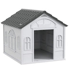 Grey plastic dog house with arched front entry and raised roof panels