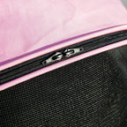 Pet stroller rain cover with pink trim, black mesh fabric, and visible zipper closure