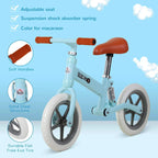 Light blue toddler balance bike with adjustable seat, orange grips, and white EVA tires
