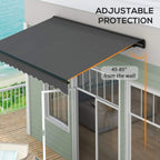 Dark grey electric awning with adjustable projection over patio windows